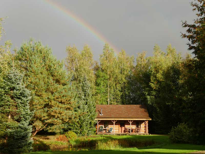 amerikaanse blokhut met regenboog